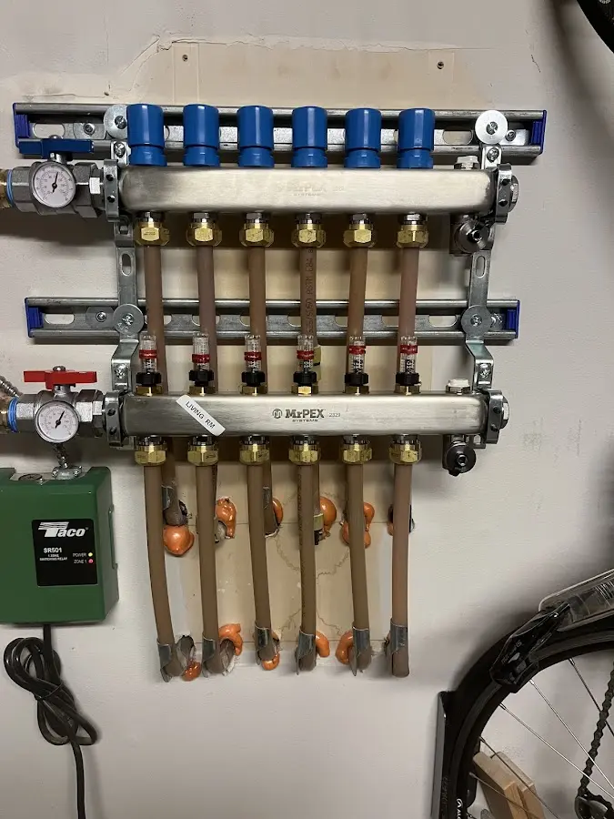 Plumber performing Gas Line Installation at a residential property in One Loudoun